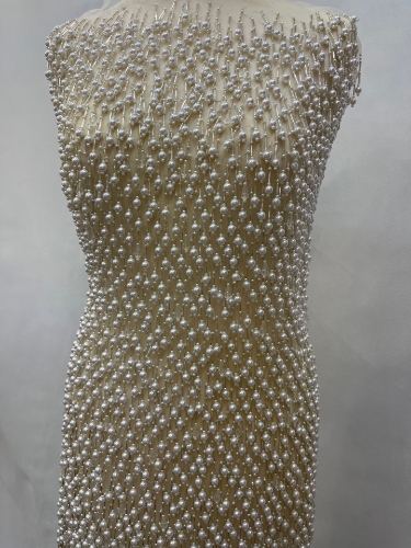 Picture of "Embroidery with fringe made of pearls and crystals"