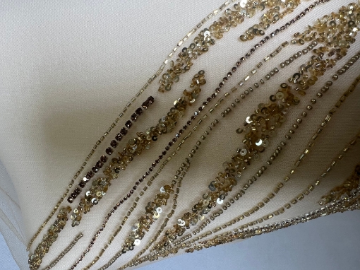 Picture of Long dress with golden crystals and feathers