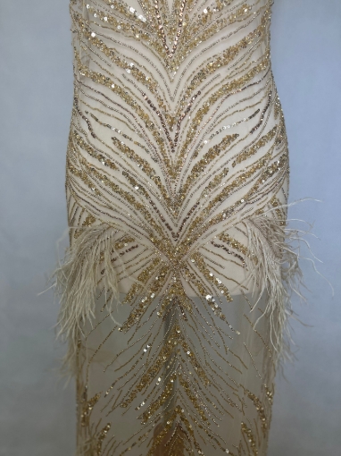 Picture of Long dress with golden crystals and feathers