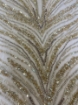 Picture of Long dress with golden crystals and feathers