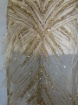 Picture of Long dress with golden crystals and feathers
