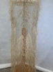 Picture of Long dress with golden crystals and feathers