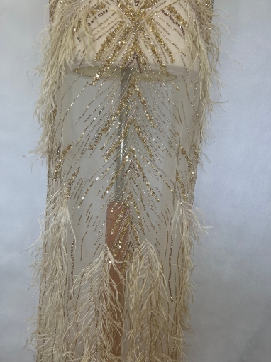 Picture of Long dress with golden crystals and feathers
