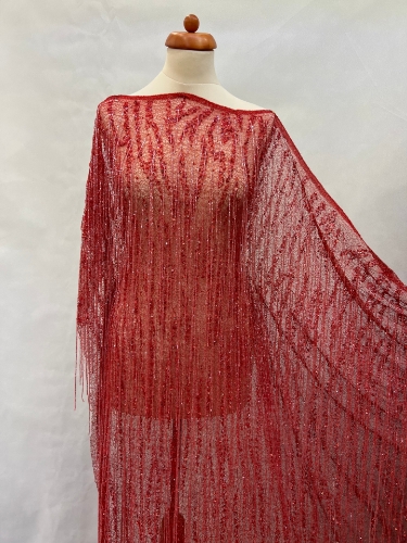 Picture of Mesh embroidery with red fringes