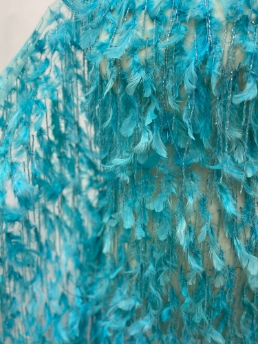 Picture of Feather and fringe embroidery