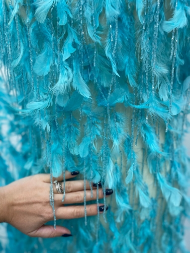 Picture of Feather and fringe embroidery
