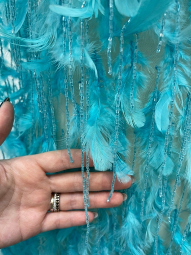 Picture of Feather and fringe embroidery