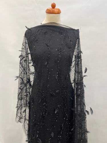 Picture of Beading with black feathers and beads