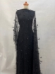 Picture of Beading with black feathers and beads