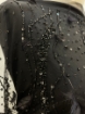 Picture of Beading with black feathers and beads