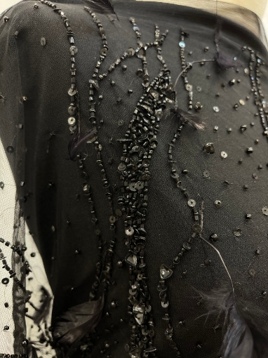 Picture of Beading with black feathers and beads