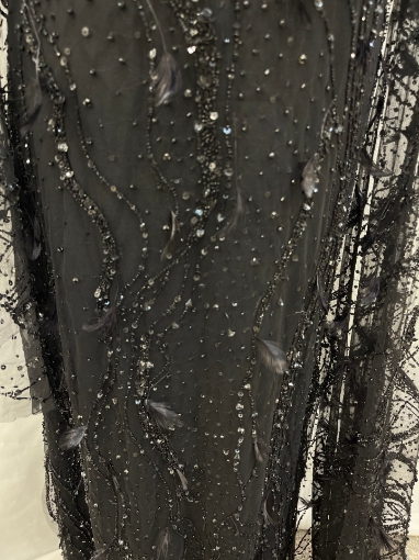 Picture of Beading with black feathers and beads