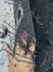 Picture of Beading with black feathers and beads