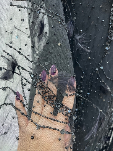 Picture of Beading with black feathers and beads