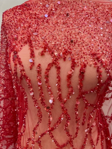 Picture of Embroidery with strings of red beads