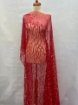 Picture of Embroidery with strings of red beads