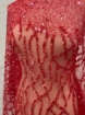 Picture of Embroidery with strings of red beads