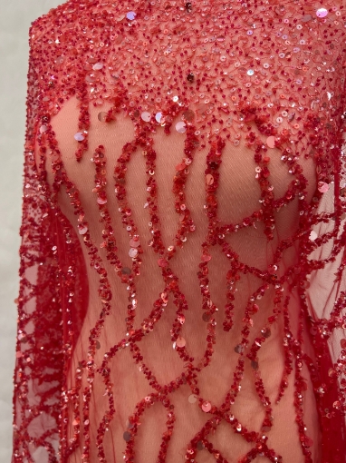 Picture of Embroidery with strings of red beads