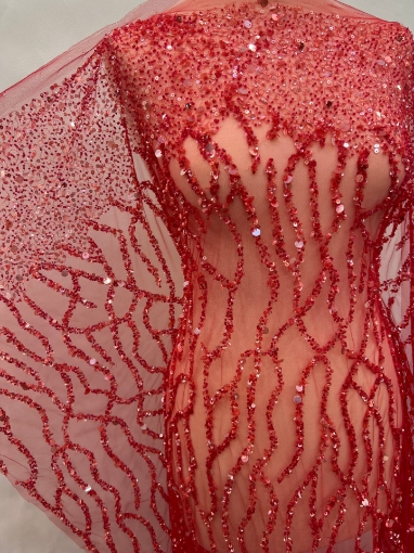 Picture of Embroidery with strings of red beads