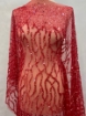Picture of Embroidery with strings of red beads