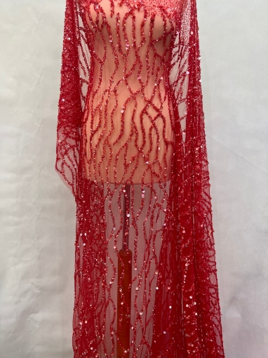 Picture of Embroidery with strings of red beads