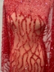 Picture of Embroidery with strings of red beads