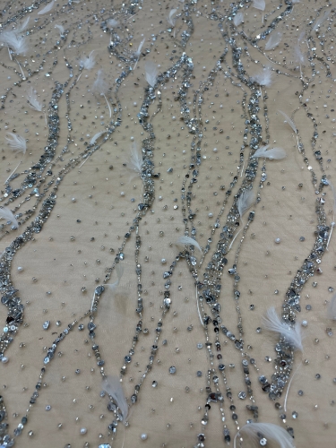 Picture of Feather embroidery with pearls and silver beads