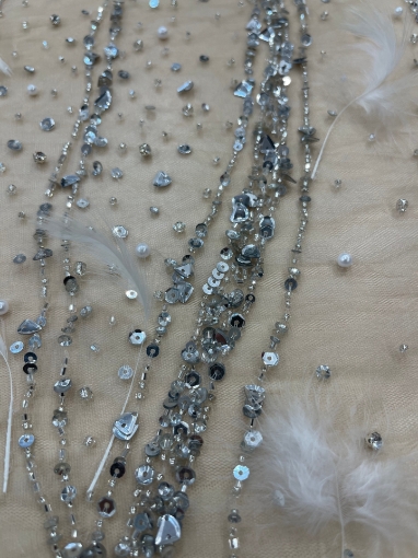 Picture of Feather embroidery with pearls and silver beads