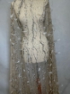 Picture of Feather embroidery with pearls and silver beads