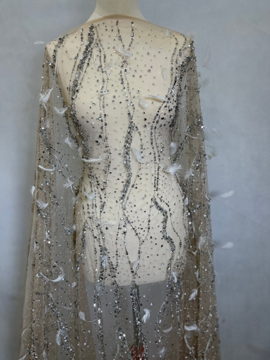 Picture of Feather embroidery with pearls and silver beads