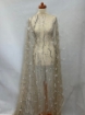 Picture of Feather embroidery with pearls and silver beads