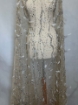 Picture of Feather embroidery with pearls and silver beads