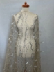 Picture of Feather embroidery with pearls and silver beads
