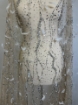 Picture of Feather embroidery with pearls and silver beads