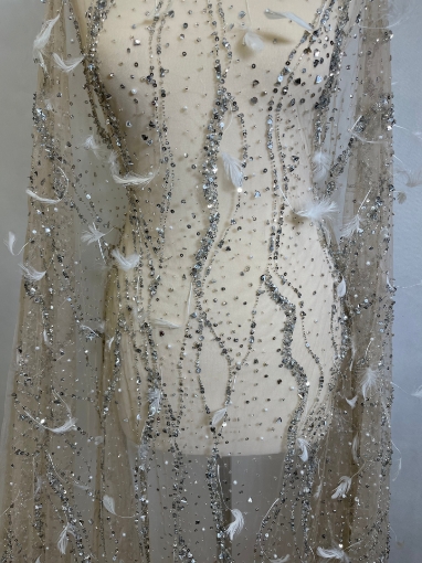 Picture of Feather embroidery with pearls and silver beads