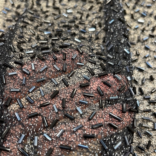 Picture of Piece of mesh embroidery with beads