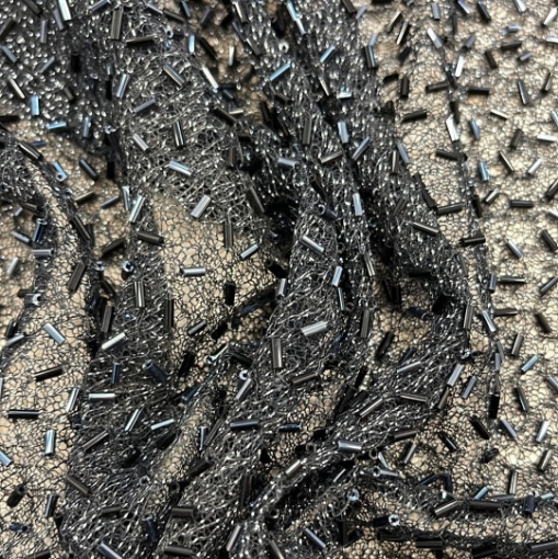 Picture of Piece of mesh embroidery with beads