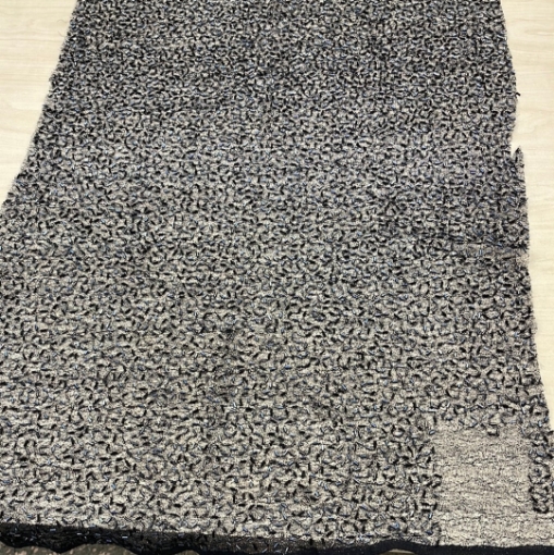 Picture of Piece of mesh embroidery with beads