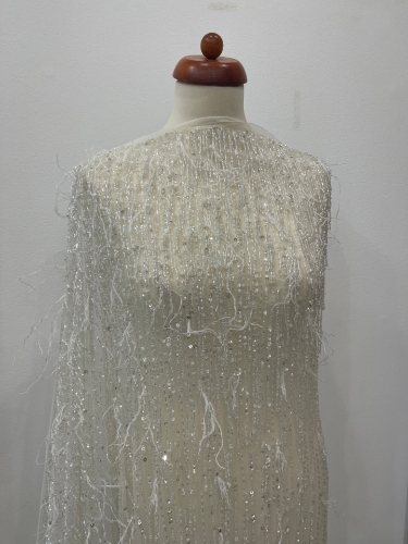Picture of "Beaded and Feather Fringe Embroidery"