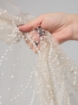 Picture of White/ivory pearl embroidery