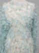Picture of Spectacular embroidery with feathers and pearls.