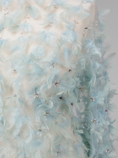 Picture of Spectacular embroidery with feathers and pearls.