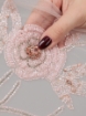 Picture of "Embroidery with crystals and pink beads"