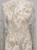 Picture of Embroidery with baby blue/champagne crystals and beads