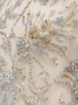 Picture of Embroidery with baby blue/champagne crystals and beads