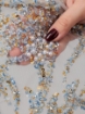 Picture of Embroidery with baby blue/champagne crystals and beads