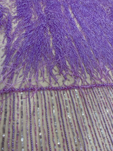 Picture of Lilac purple embroidery with fringes and feathers