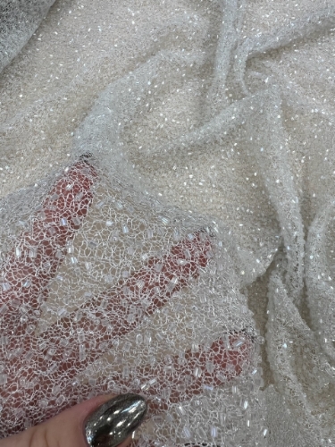 Picture of "Elastic mesh embroidery with glass beads"