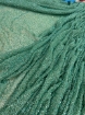 Picture of Mesh embroidery with green glass beads