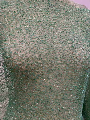 Picture of Mesh embroidery with green glass beads